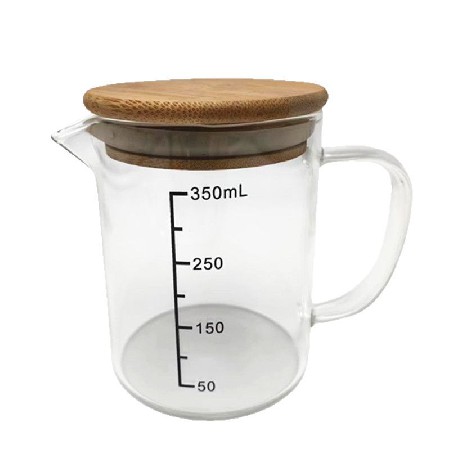 High borosilicate glass measuring cup with precise scale for kitchen use. High temperature resistant coffee cup with handle for baking and measuring tools