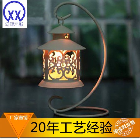 Fashionable and personalized stainless steel wrought iron candle stand, exquisite hollow out white wind lamp holder, candle holder, custom handmade candle vessel