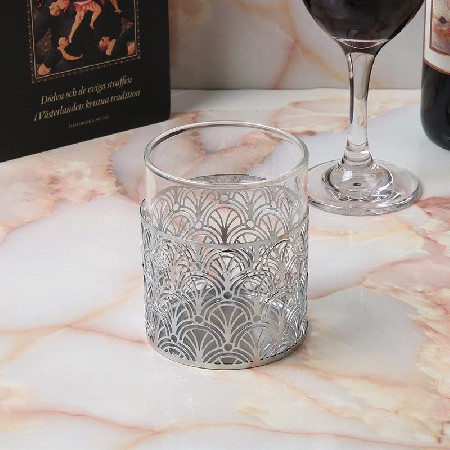 Candle holder with glass cover